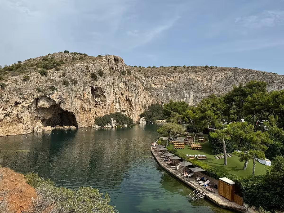 Athens Riviera Lake Vouliagmeni view with sunbeds by the lagoon, add-on stop on Cape Sounion sunset tour