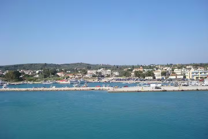 Port of Kyllini waterfront with ferries and town view, arrival point for private transfer from Athens, Greece