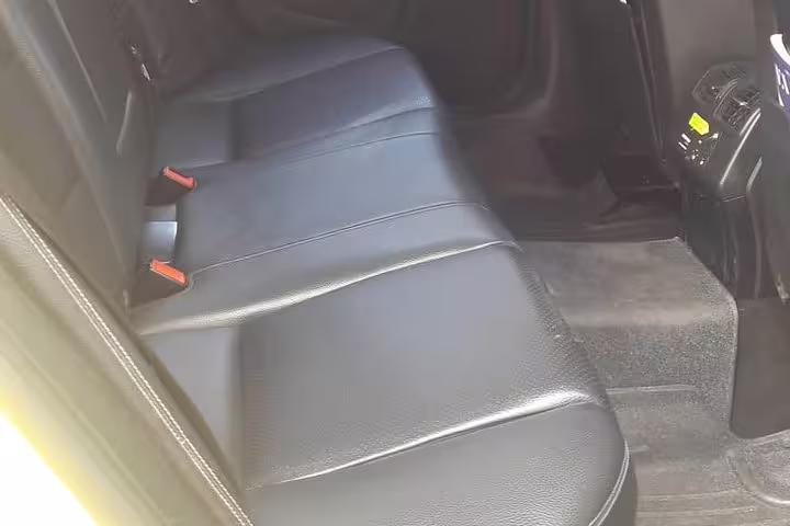 Comfortable black leather rear seats in private car for Best of Athens fast tour with air-conditioned ride