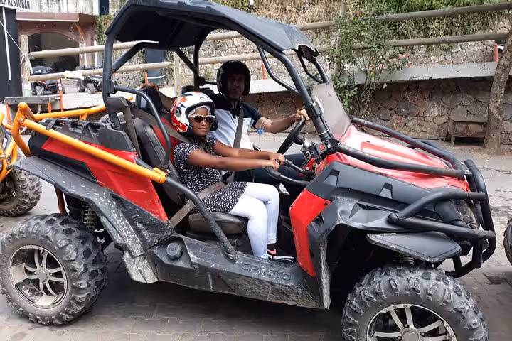 ATV safari in Masukiye on Sapanca day trip from Istanbul, riders in helmets on off-road buggy