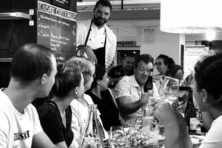 Guests enjoy a convivial tasting with wine after the Avignon cooking class led by an exceptional local chef