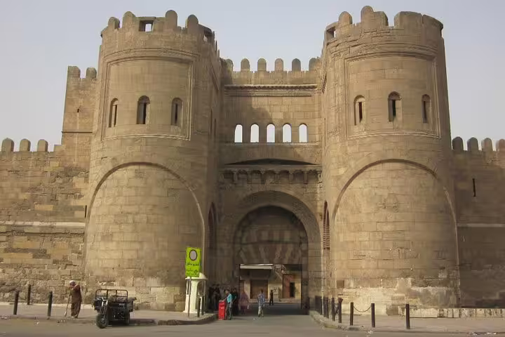 Bab al-Futuh gate on Al-Mu'izz Street in Islamic Cairo, key stop on Al Azhar Park dinner tour