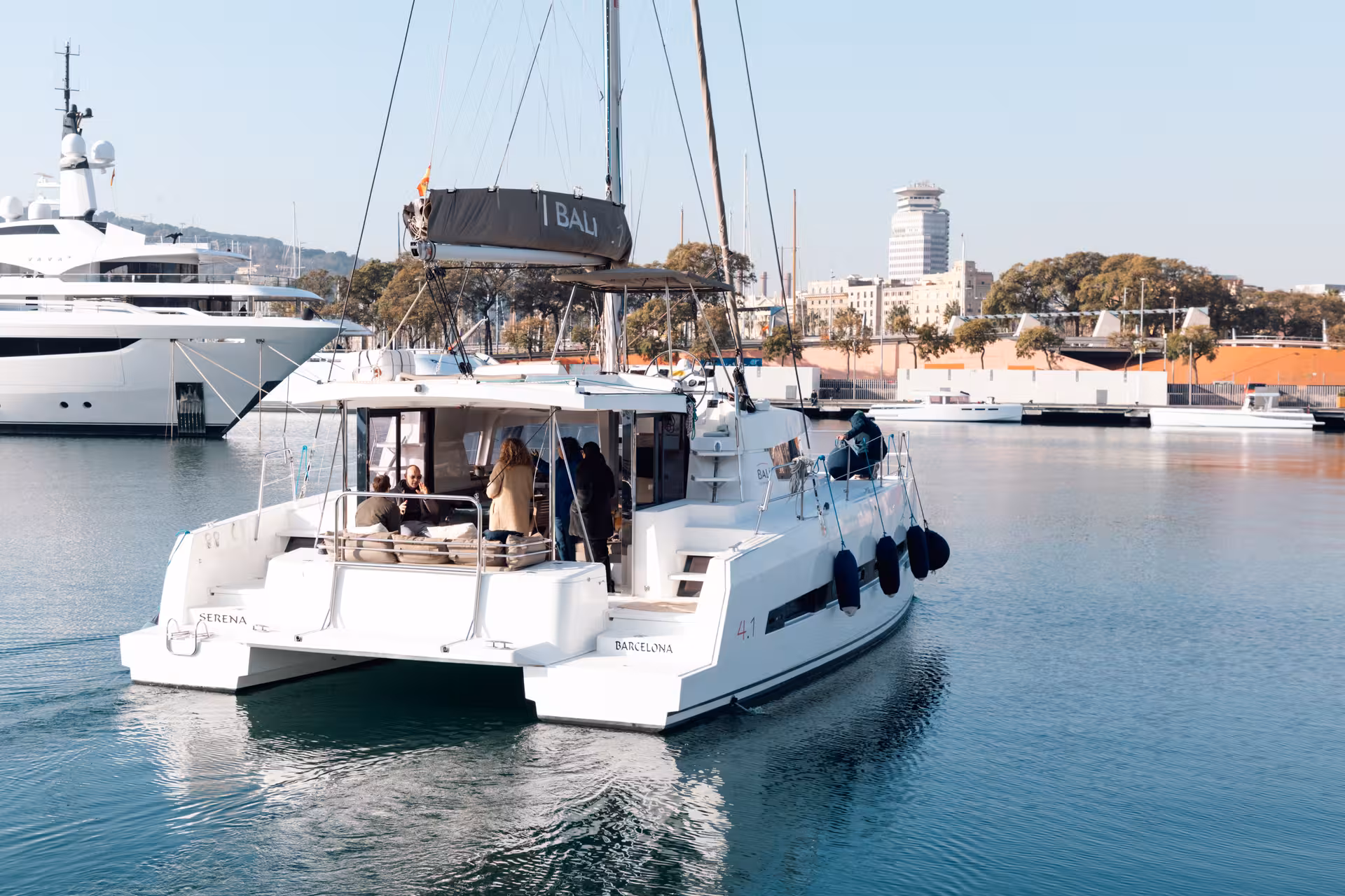 Bali 4.2 private luxury catamaran moored in Port Vell Barcelona, ideal for a 4-hour charter cruise