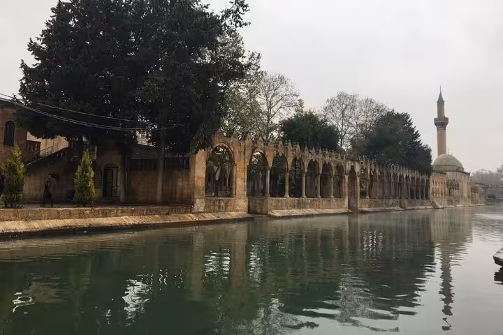 Balıklıgöl reflecting pool and historic arches in Şanlıurfa, visited on private Göbeklitepe tour from Istanbul by plane