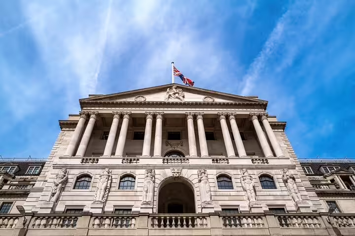 Bank of England facade with Union Jack, key stop on a full-day London sightseeing tour with a local in the City