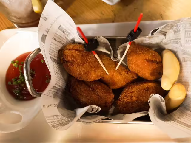 Savor delicious croquetas and aioli served in a rustic tavern setting on our Food & Drink Private Tour of Barcelona.