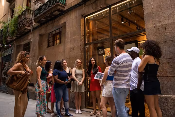 Group discovering hidden gems in Barcelona's charming streets during a walking tour.