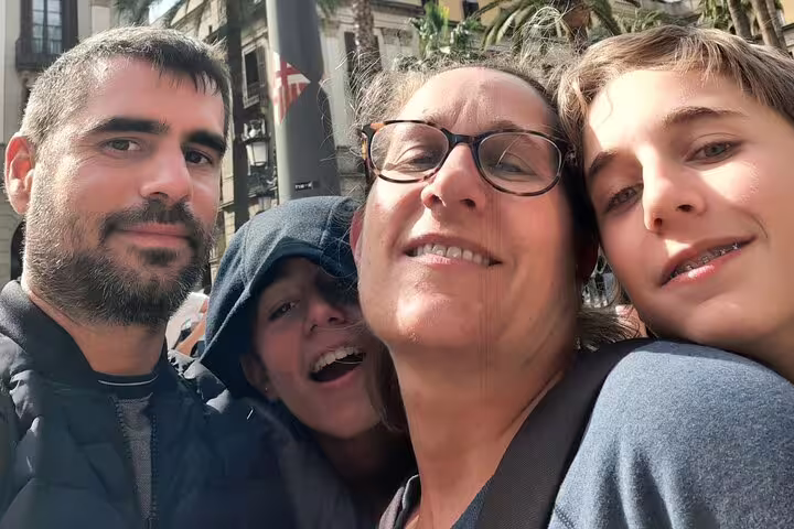 Friends taking a selfie on Barcelona Gothic Quarter scavenger hunt, exploring landmarks on a city highlights walk