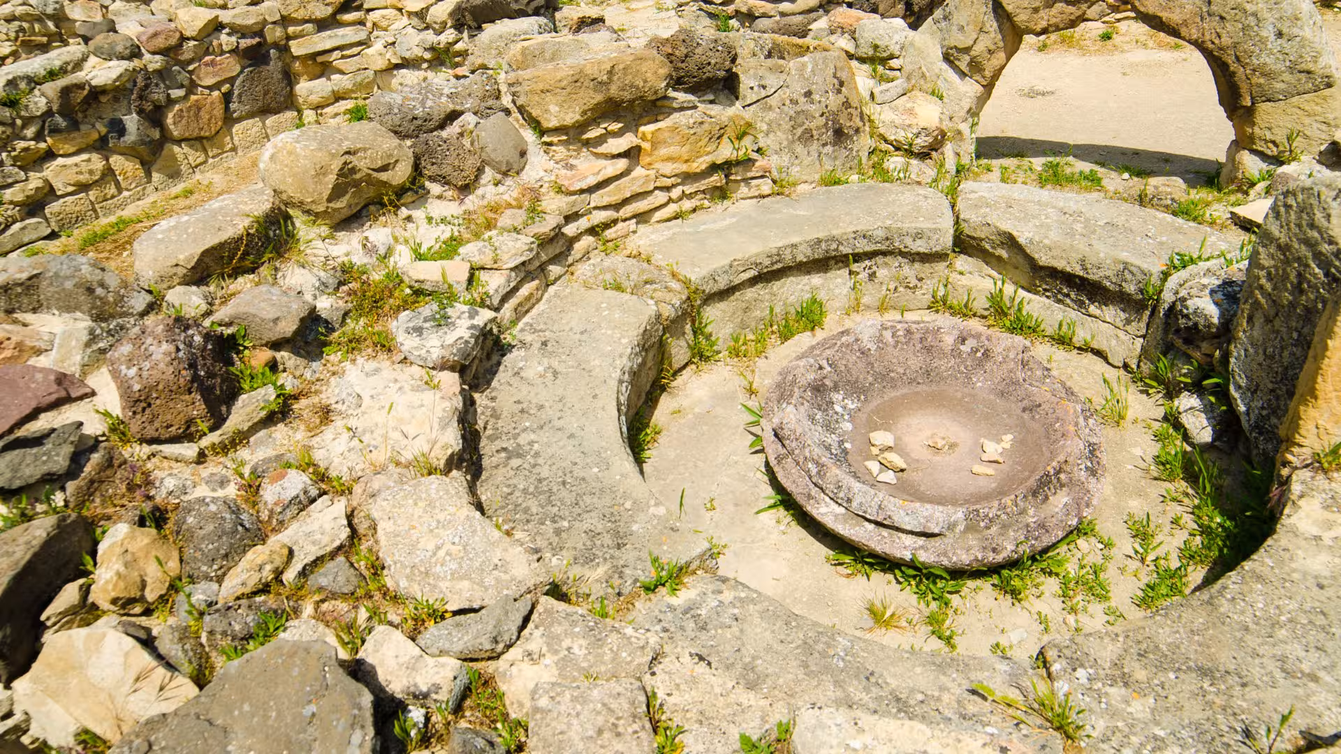 Close-up of a circular stone structure at Barumini's archaeological site, highlighting Sardinia's rich historical heritage.