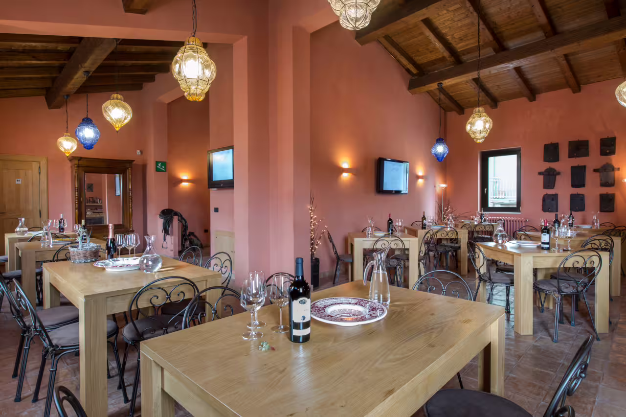 Rustic Basilicata winery tasting room set for Lucanian wines, ideal stop after exploring volcanic tuff caves