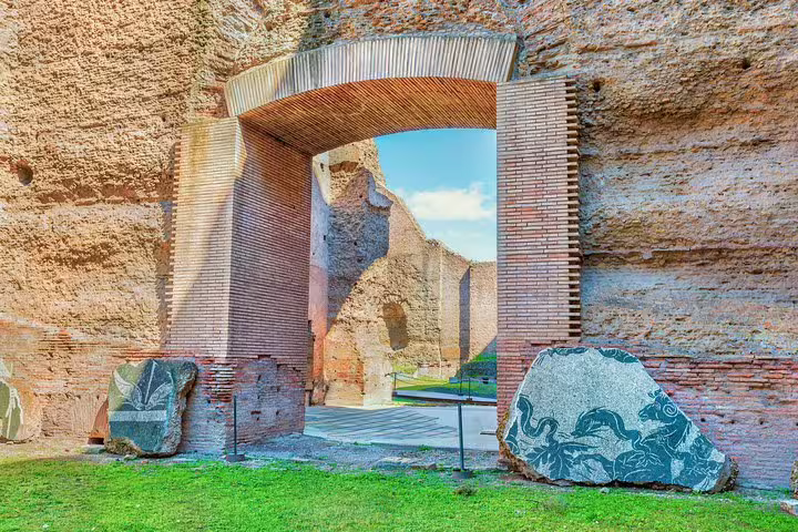 Ancient brick archway and mosaics at the Baths of Caracalla, featured on a Rome private tour with VIP entrance access