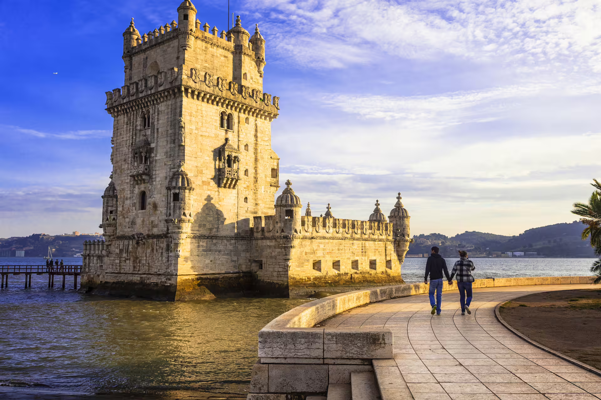 Lisbon's iconic Belém Tower at sunset, a highlight on the Lisbon, Sintra, Estoril excursion with skip-the-line Pena Palace tickets.