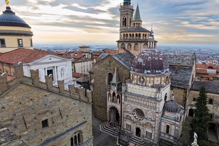 Aerial view of Bergamo Città Alta with Basilica di Santa Maria Maggiore on a self-guided highlights tour