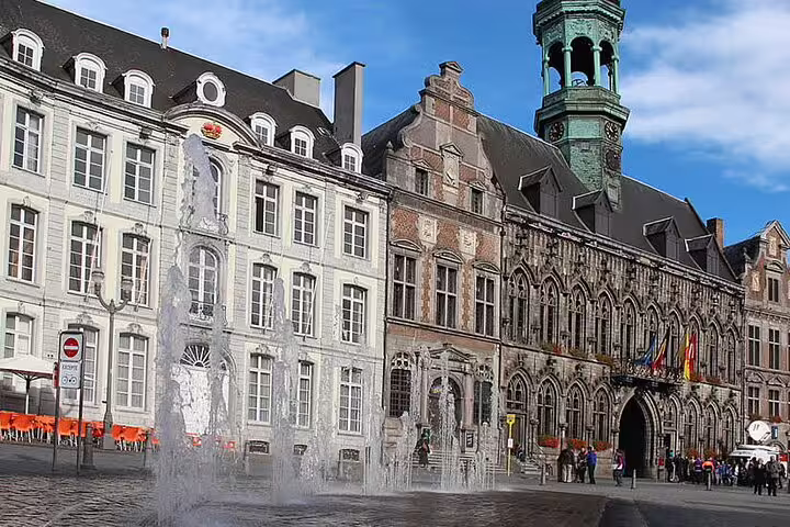 Grand-Place Bergen (Mons) with fountain and historic town hall, key stop on the e-scavenger hunt tour