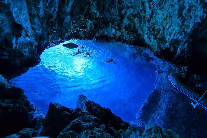 Swimming inside Biševo Blue Cave on the scheduled Blue Cave & 5 Islands tour from Split or Hvar