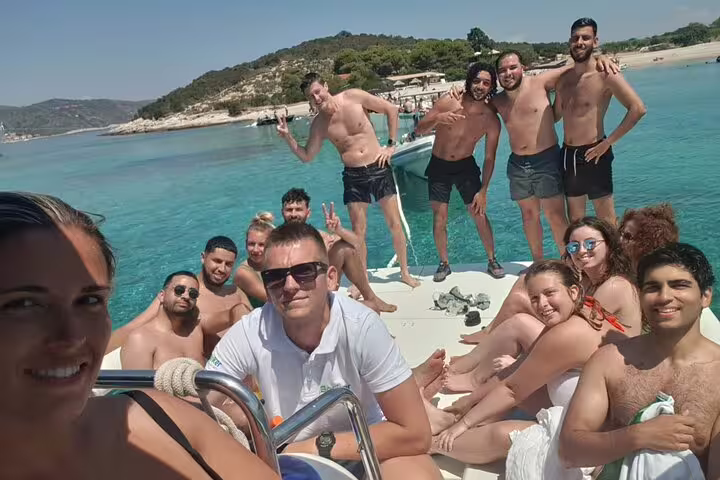 Group relaxing on speedboat in turquoise Adriatic on Blue Cave & 5 Islands tour from Split, Croatia