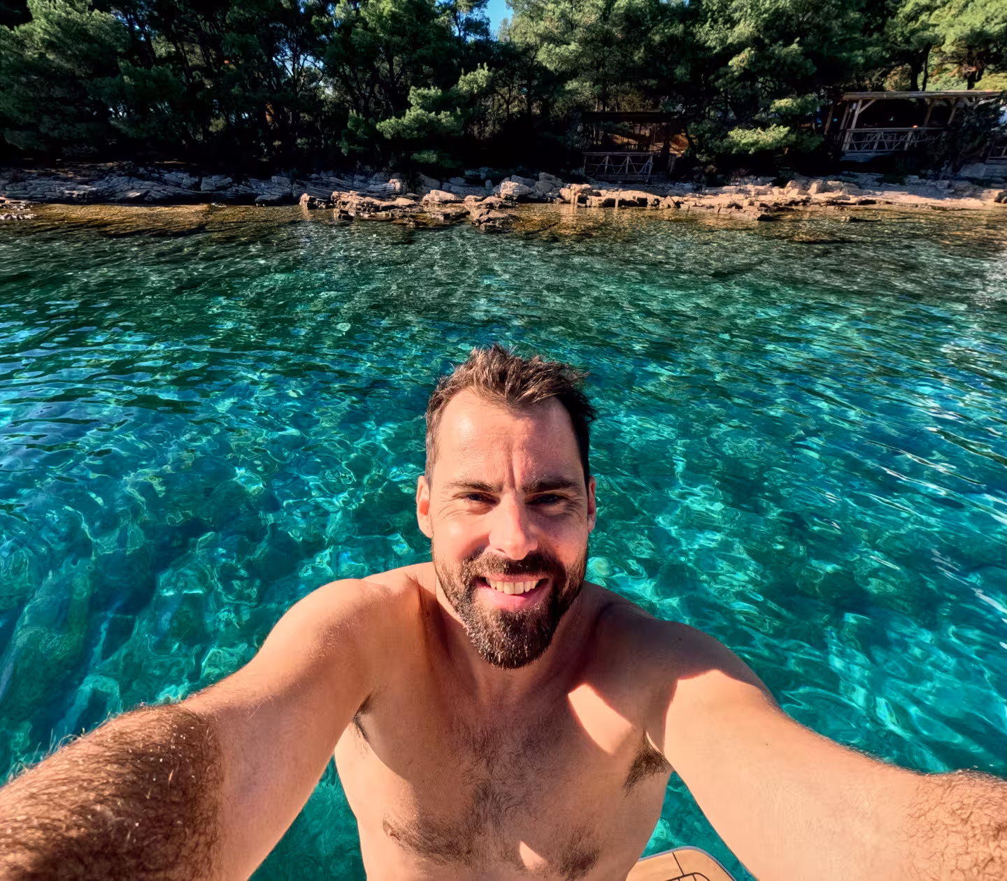 Swimming in emerald Blue Lagoon bay during 3 Islands speedboat tour, hidden cave visit and cliff jumps