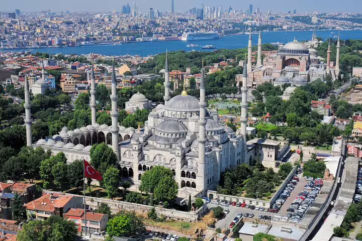 Aerial view of the iconic Blue Mosque and Hagia Sophia with the Bosphorus in the background in Istanbul.