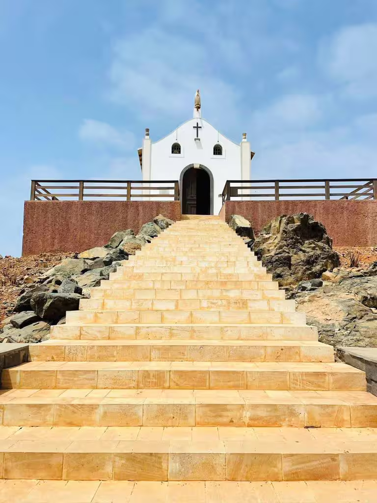 Discover Boa Vista's historic chapel with scenic views on the Shark & Turtle Bay, Desert, Shipwreck & Santa Mónica Beach Tour.