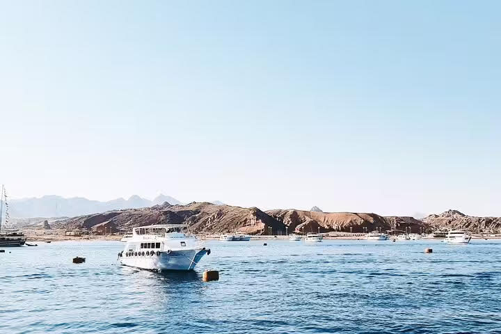 Boat cruising the Red Sea toward Mahmya Island from Hurghada, Egypt, for a full-day snorkeling trip