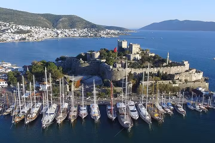 Aerial view of Bodrum Castle and marina yachts, scenic stop on a private Bodrum city tour from cruise port