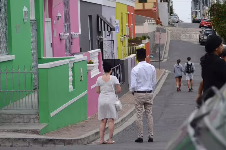 Colorful houses line the street in Bo-Kaap, Cape Town, offering a vibrant cultural experience on your private tour.