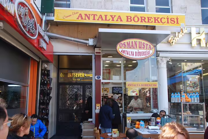 Street-side börek shop in Izmir, Turkey, a tasty stop on a Turkish food walking tour with local pastries