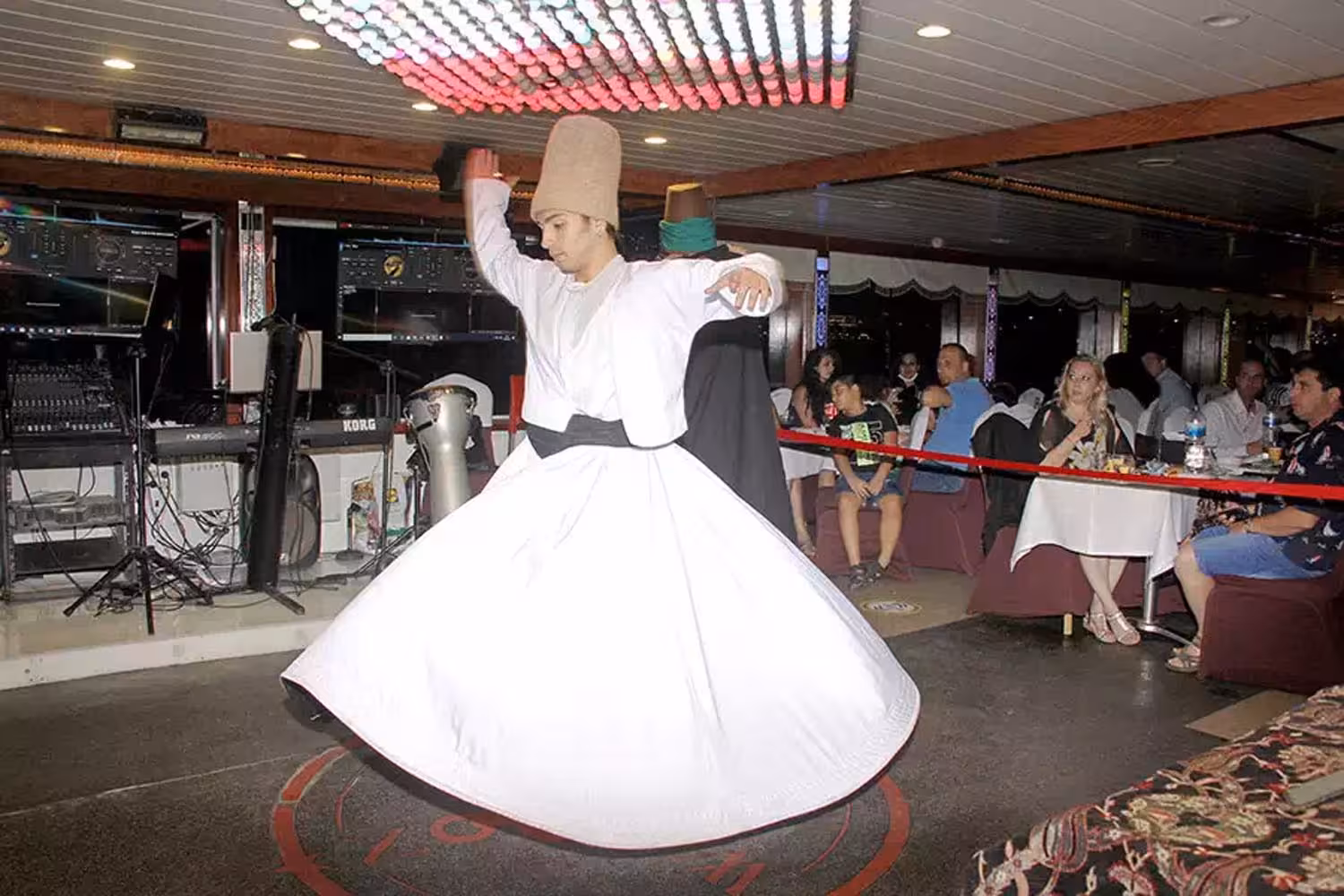 Whirling dervish performance on Istanbul Bosphorus dinner cruise with Turkish dinner and onboard show
