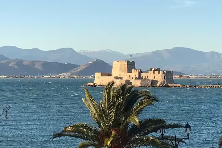 Bourtzi Castle in Nafplio harbor, scenic stop on Epidaurus Mycenae Nafplio private tour from Athens