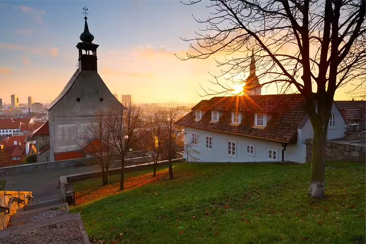 Sunset view from Bratislava Castle grounds over Old Town, featured on self-guided scavenger hunt highlights tour