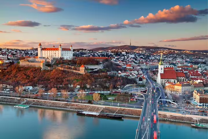 UFO Bridge and Old Town skyline with Bratislava Castle, route view for self-guided scavenger hunt tour