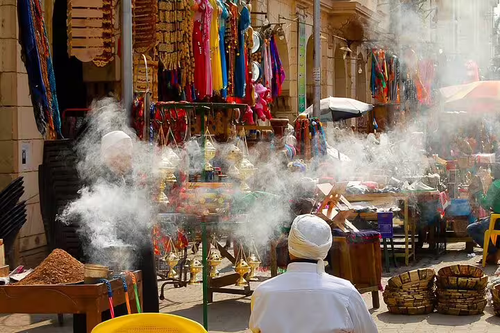 Cairo bazaar with colorful souvenirs and incense smoke, authentic stop on Egypt tours package for 6 days