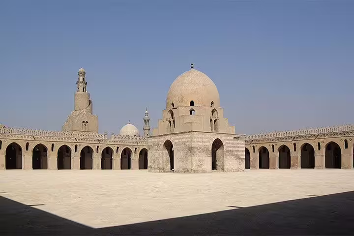 Open courtyard of Cairo Citadel mosque complex with domes and arches, featured on NMEC to citadel and bazaars tour