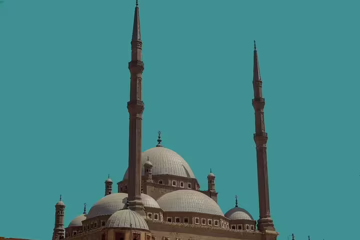 Mosque domes and twin minarets in Cairo on private shore excursion from El Sokhna port to Citadel