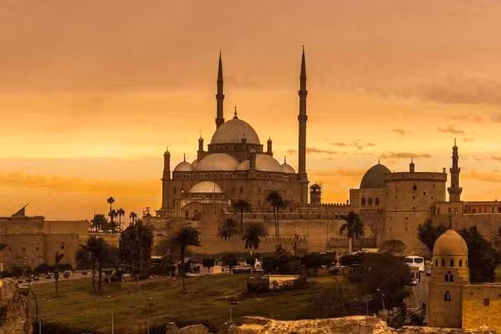 Sunset view of Cairo Citadel and Mosque of Muhammad Ali, iconic landmark on Museum Citadel and Khan El Khalili tour