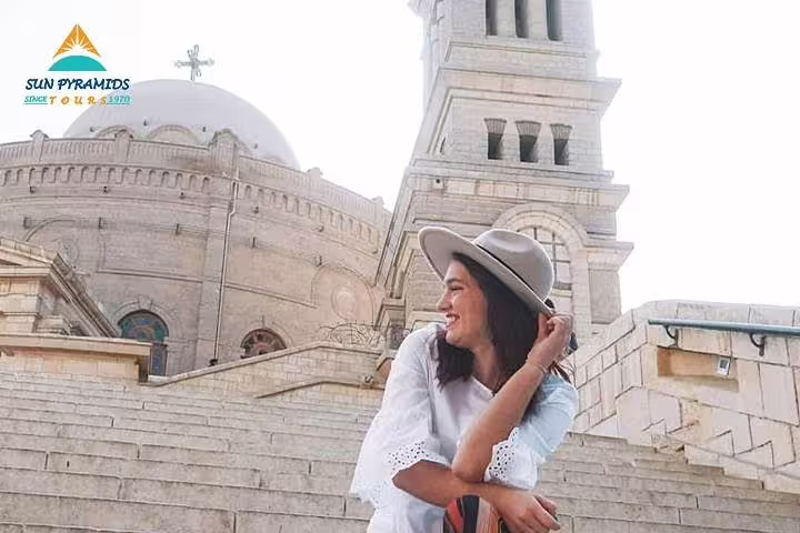 Traveler at Cairo Citadel with Muhammad Ali Mosque dome, Christian and Islamic Cairo day tour Egypt