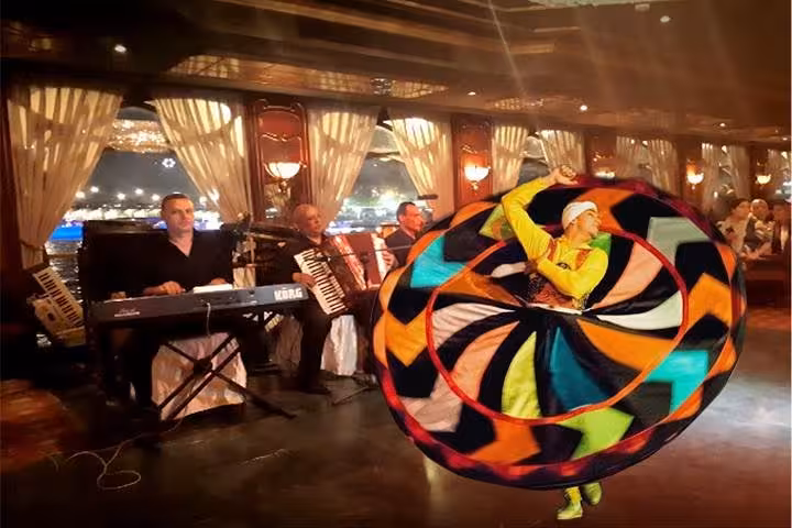 Tanoura spinning dancer and live band on Cairo Nile dinner cruise, evening add-on to Giza Pyramids tour