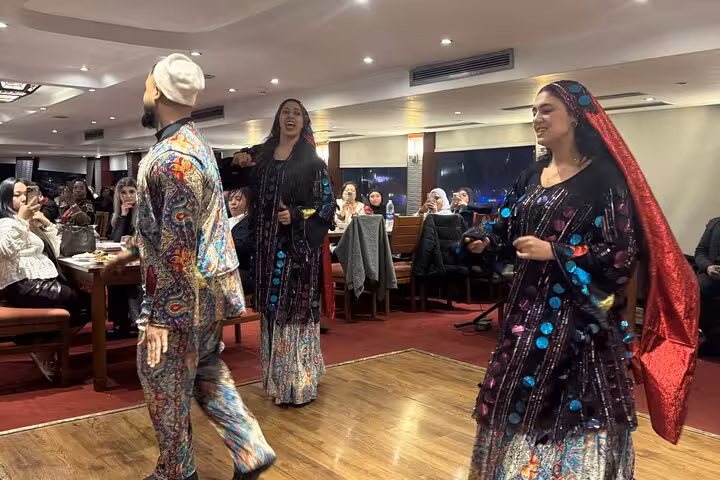 Tanoura-style folkloric dancers perform on Cairo Nile dinner cruise with buffet dinner and hotel pickup