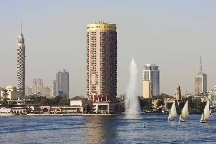 Cairo Nile skyline with Cairo Tower and felucca boats, stop on Hurghada to Giza Pyramids day tour