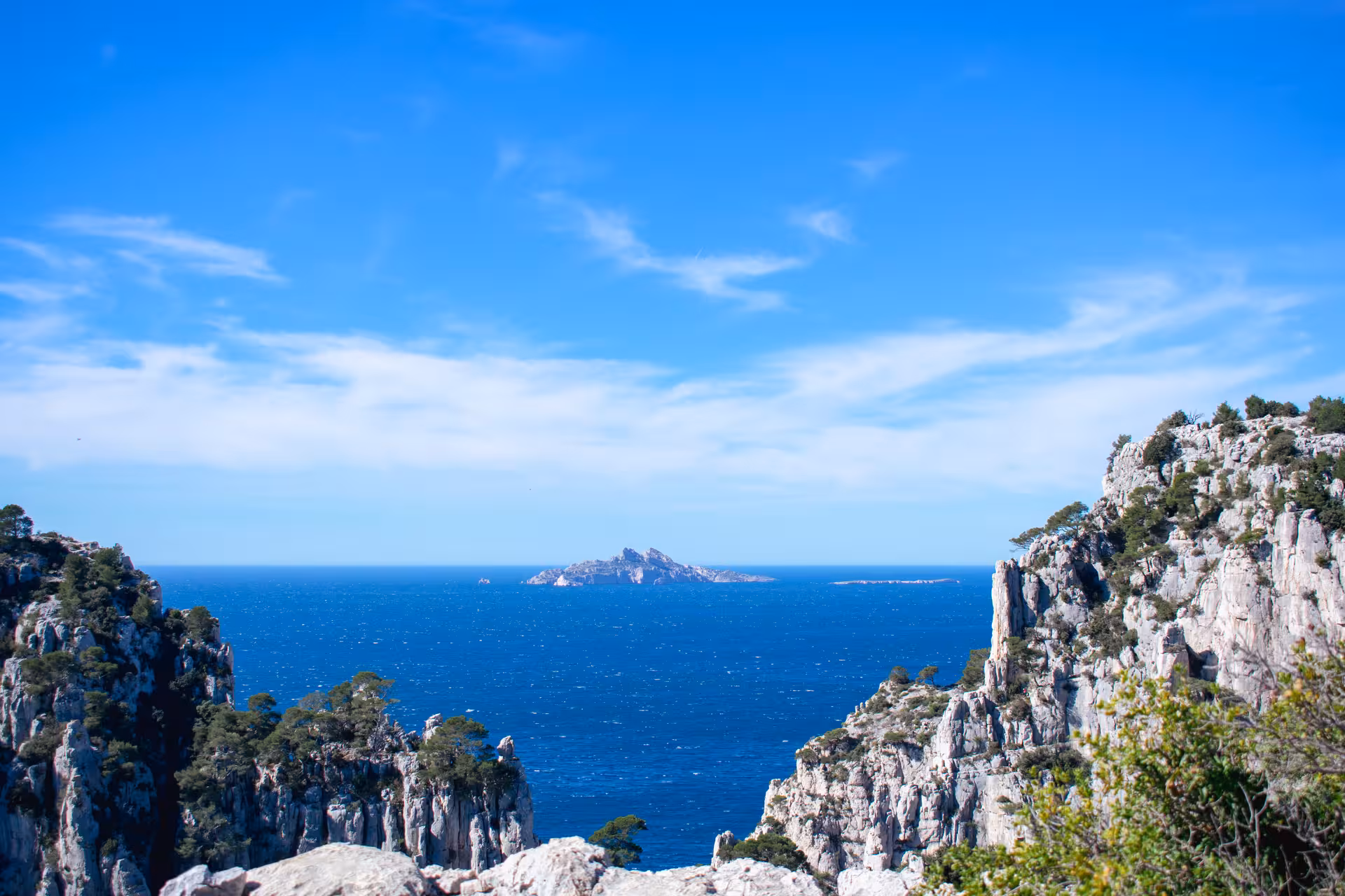 Panoramic view over Calanques National Park cliffs from Luminy hike, looking out to the Mediterranean Sea