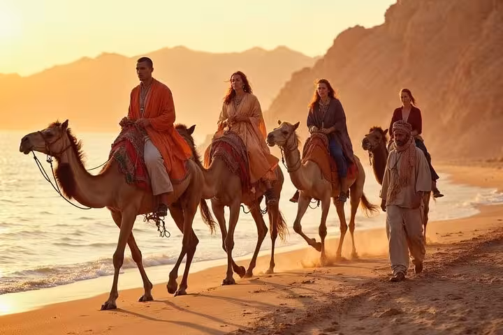 Camel ride on Dahab beach at sunset from Sharm El-Sheikh, part of Blue Hole and Canyon jeep safari tour