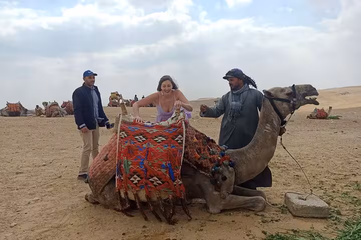 Camel ride experience near Giza desert with local guide, highlight of 4-day Cairo tour package with accommodation