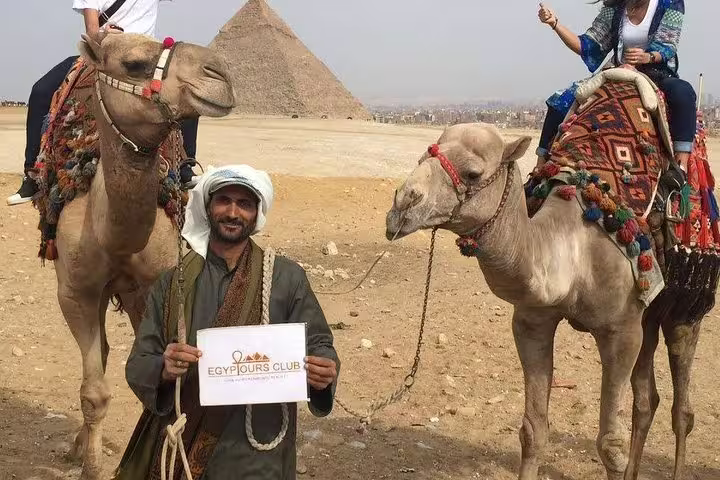 Camel ride at Giza Pyramids with local guide, private Cairo and pyramids tour by plane from Sharm El-Sheikh