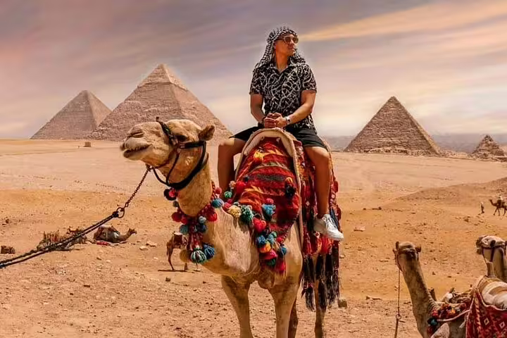 Camel ride photo at Giza Pyramids, highlight of private Alexandria Port shore excursion to Cairo
