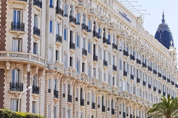 Belle Époque luxury hotel facade in Cannes on a private sightseeing tour with driver to Nice, Eze and Monaco