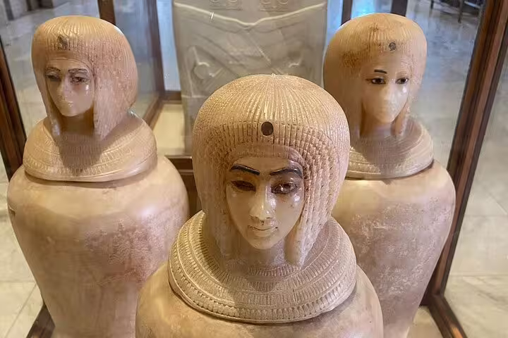 Canopic jars in Luxor Museum display, key stop on half-day Luxor and Mummification Museums guided tour