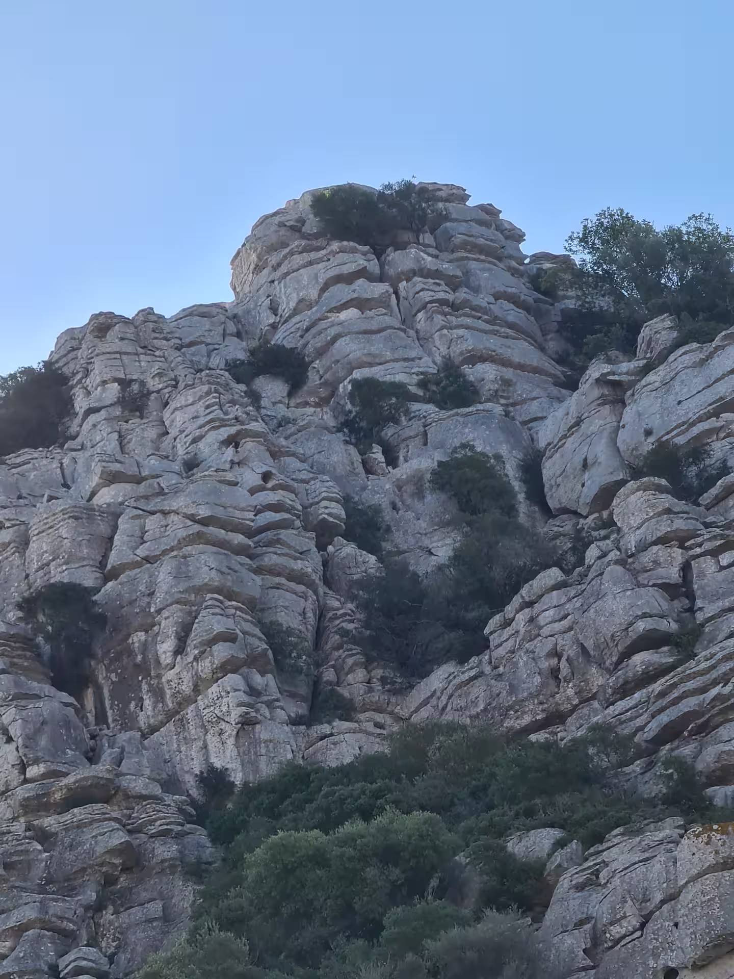 Majestic rock formations of Canuto de la Utrera under a clear blue sky, perfect for private hiking adventures.