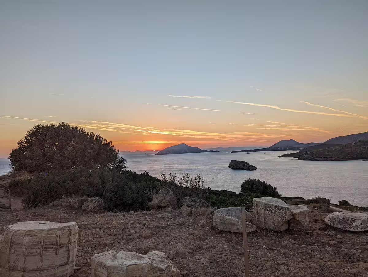 Cape Sounion sunset over the Aegean Sea from Temple of Poseidon ruins on a private Athens Riviera tour