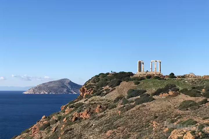 Cape Sounion cliff view of Temple of Poseidon above the Aegean Sea, scenic stop on Athens sunset tour