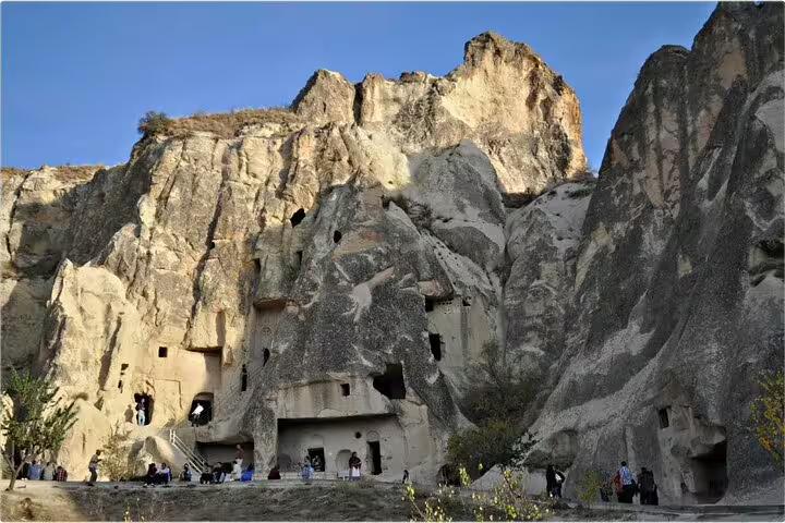Cappadocia cave monastery carved in rock cliffs, stop on full-day Cappadocia tour from Istanbul by flight